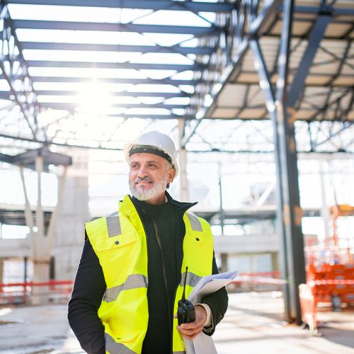 man-engineer-with-walkie-talkie-standing-on-constr-small.jpg